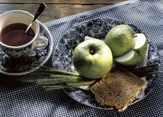 Two Apples; A Slice of Whole Grain Bread; Tea