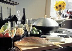 Red Snapper in Kitchen with Champagne and Fruit