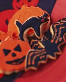 Various Halloween biscuits (pumpkins, cat, bat)