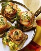 Steak on toast with tomatoes and lettuce