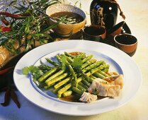Asparagus with coriander & ginger sauce & fish fillet from Asia