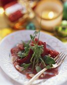 Goose breast carpaccio with watercress and beetroot