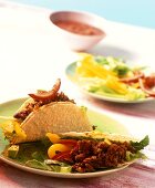 Tacos with red chili sauce, mince and bean puree