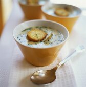 Potato and cheese soup with toasted bread