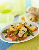 Soft cheese and tomato salad