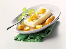 Cream cheese terrine with sea buckthorn sauce & kumquats