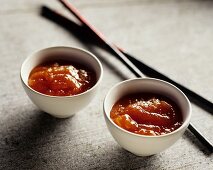 Two bowls of Chinese sauce