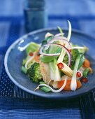 Asian vegetable salad with chicken breast