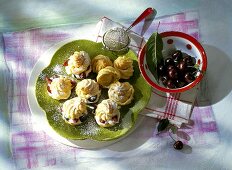 Sweet cream puff filled with cherries