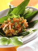 Tomato salsa with chard on ramsons (wild garlic) leaves