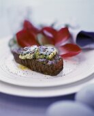 Beef fillet with herb butter and radicchio