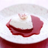 Cream cheese heart on raspberry sauce