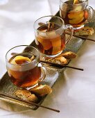 Three cups of cherry and amaretto punch