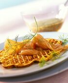 Potato waffle with salmon and mustard and dill sauce