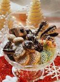 Lots of different Christmas biscuits in a glass bowl