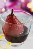 Red wine pear, served in a glass