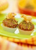 Fruit puree muffins with marzipan lambs