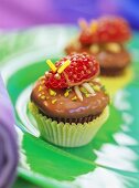 Strawberry and chocolate muffins with strawberry beetles