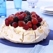 Meringue 'Pavlova' with cream and fresh berries