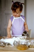 Small girl baking