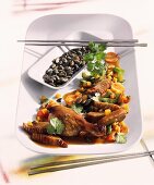 Duck with vegetables cooked in the wok (Asia)