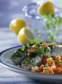Parsley trout in a roasting sleeve with tomatoes