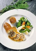 Rabbit roulade with mustard sauce and vegetables