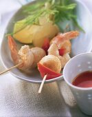 Colourful shrimp kebabs with dip
