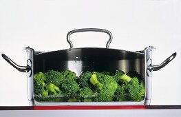 Broccoli boiling in stainless steel pan