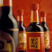 Various Asian spicy sauces in bottles