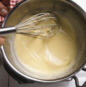 Beating zabaione over bain-marie