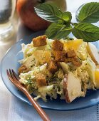 Celery & Chinese cabbage salad with orange, apple & croutons