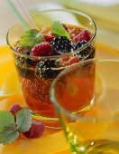 Summer punch with berries and lemon balm