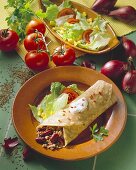 Chili con carne wrap with iceberg lettuce, tomatoes & sweetcorn