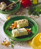 Aubergine and sheep's cheese wrap with tomatoes and peppers