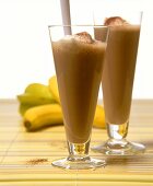 Chocolate shakes with cream; bananas