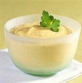 Tahini dip with parsley leaf