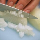 Peeling and slicing an onion