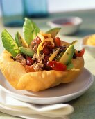 Mexican mince salad in tortilla basket