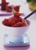 Strawberry sorbet in white bowl