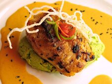 Fried marinated cod fillet on soya bean puree