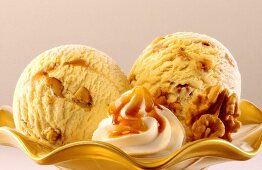 Walnut ice cream with cream and caramel sauce