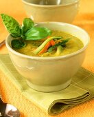 Courgette soup with carrots and basil