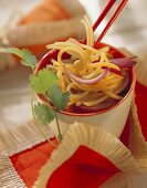 Soya noodles with onions in a bowl