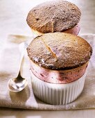 Cherry soufflés in the baking dishes