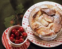 Kipfelkoch (sweet pudding from Austria) and cherries