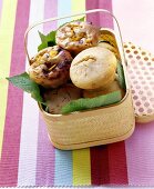 Banana muffins and chocolate & mango muffins in basket