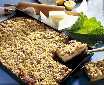 Rhubarb crumble cake on baking tray