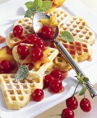 Coconut waffles with sour cherry compote