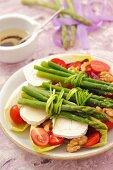 Green asparagus with goat's cheese on chicory